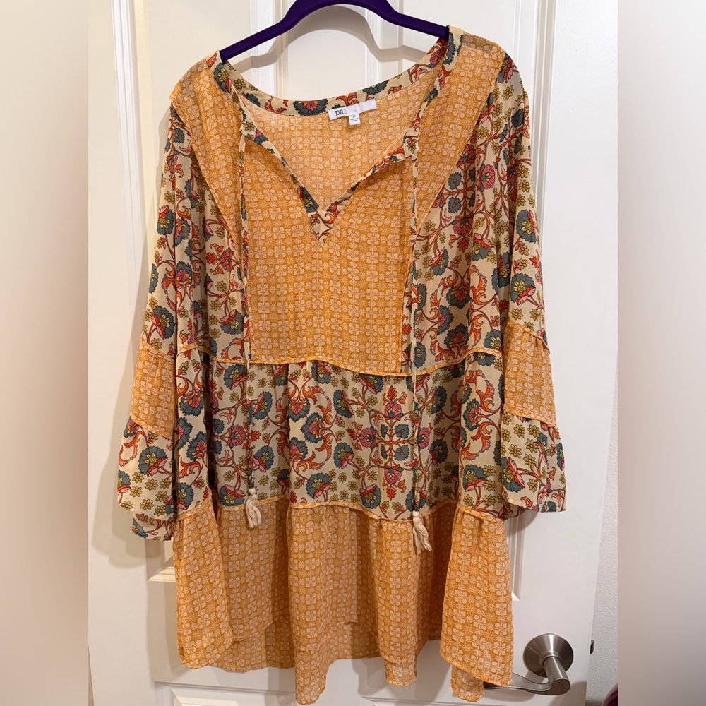 DR2 belle sleeve sheer long line high low blouse.